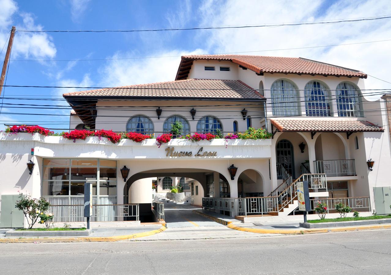 Apart Hotel Nueva Leon ปูแอร์โตมาดริน ภายนอก รูปภาพ